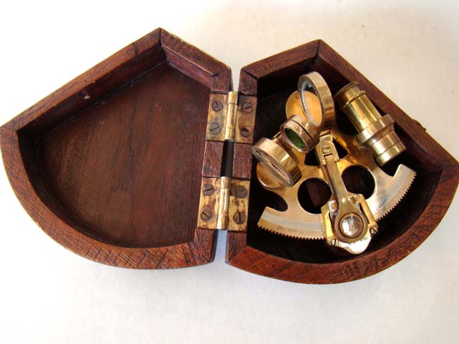 A rare and diminutive English brass framed quarter size sextant with platinum scale dated 1914